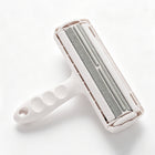 The pet hair roller in white, grey and black