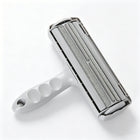 The pet hair roller in white, grey and black